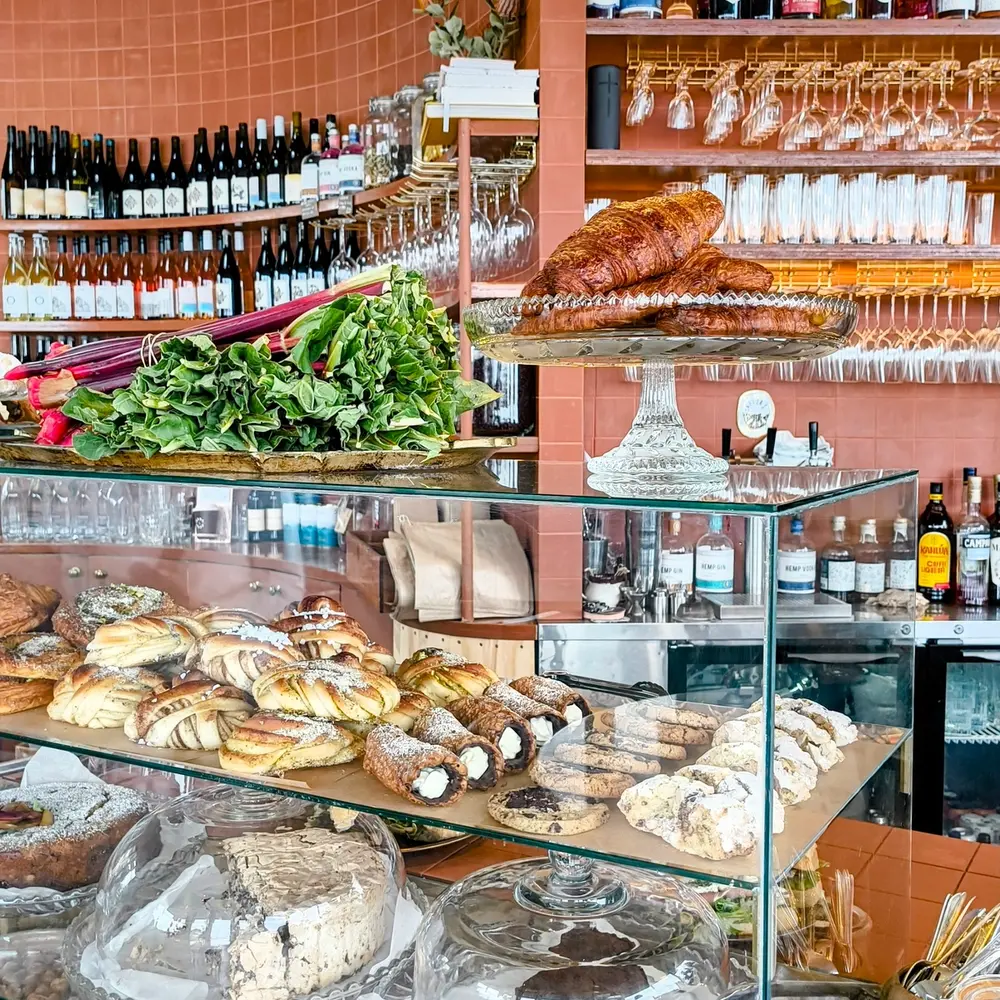 Breads, cakes, coffee and wine on display in Udder and Hoe