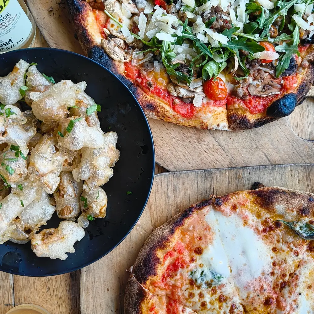 Delicious plates of food on the table at Trulli Cucina