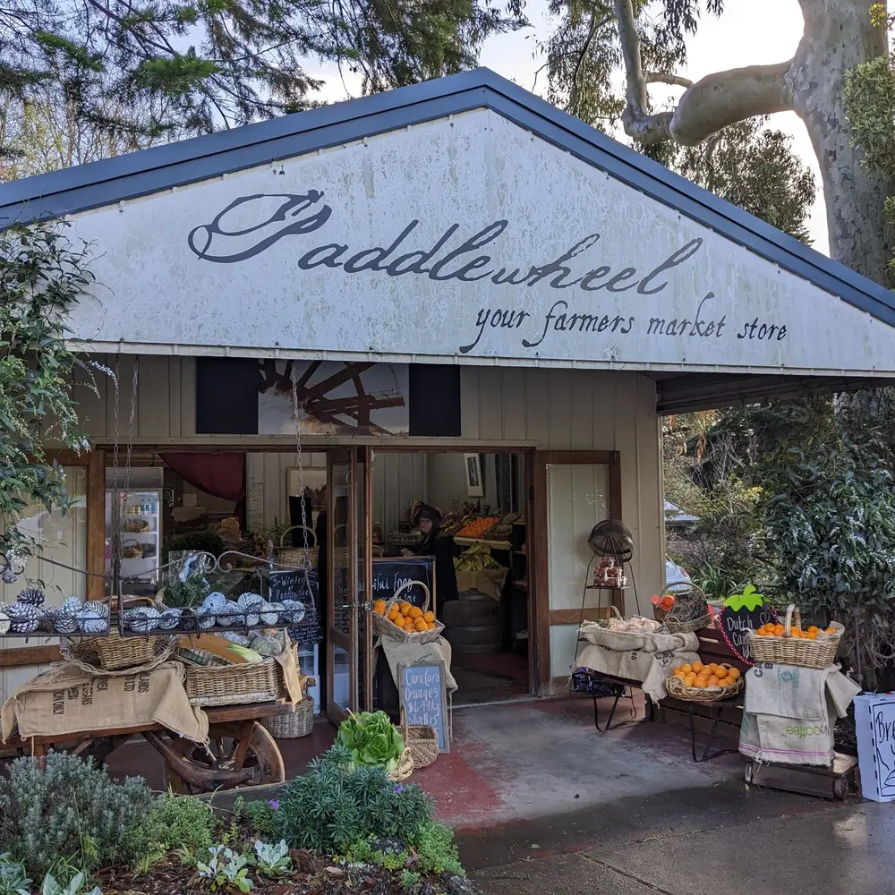 view of paddlewheel koonwarra store entry with some fresh produce displaced in the patio