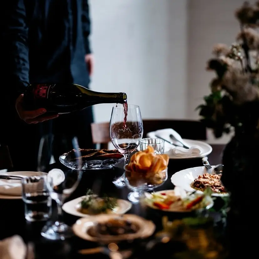 Table set with food and wine at Messmates Dining room
